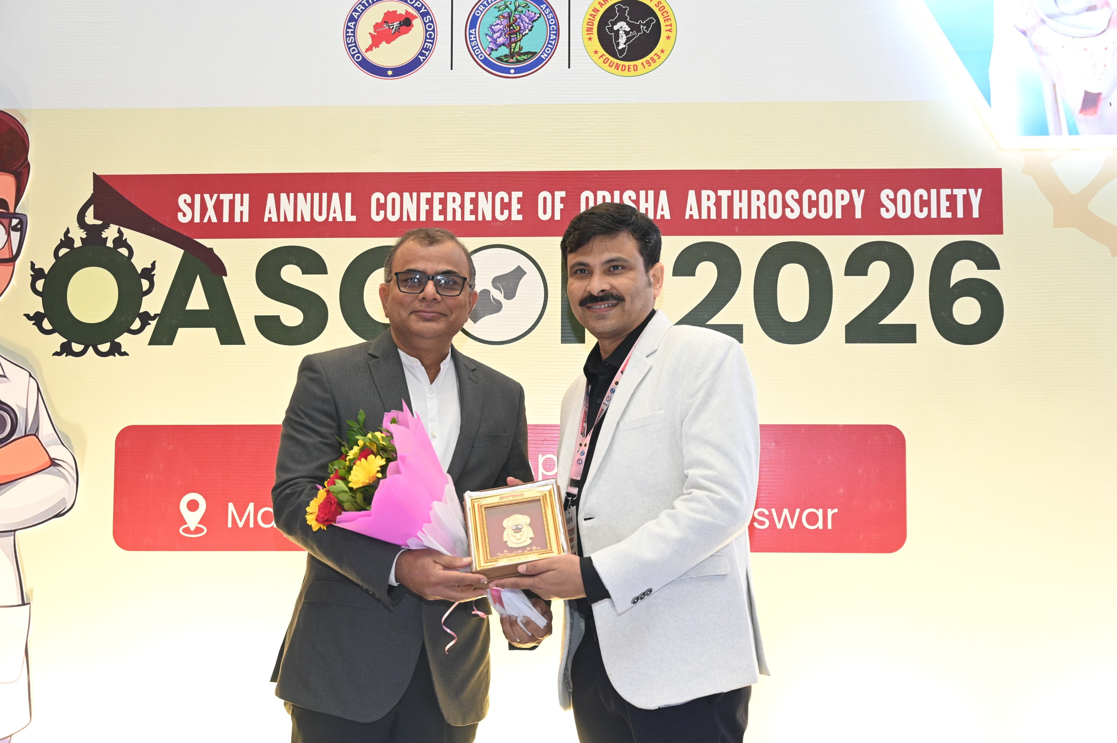 Dr. Sanjay Trivedi receiving recognition at OASO 2026